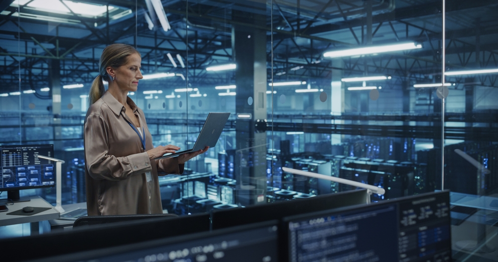 Caucasian,Female,Data,Center,Specialist,Analyzes,Server,Performance,On,A HR and IT