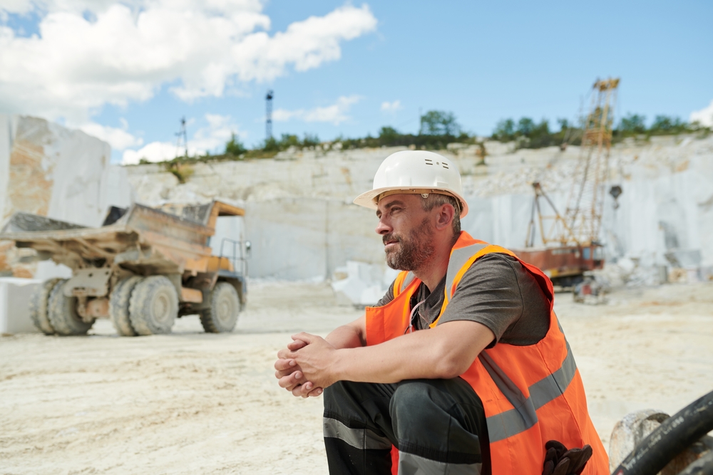 Tired,Worker,Of,Marble,Quarry,Sitting,In,Front,Of,Camera Bullying & Harassment